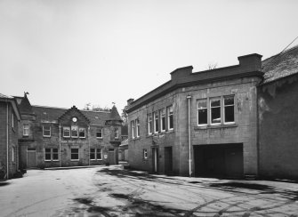 View from ESE of yard and Reception Centre, with Office Building to right.