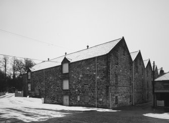 View from SW of S and W sides of Warehouse No 4.