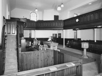 Interior. View from W showing pulpit and gallery