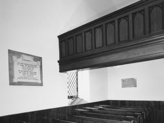 Interior. Gallery front and Earl of Seafield memorial tablet. Detail