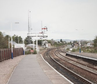 View of signal gantry and signal box to N side of station