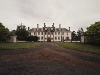 General view from N showing entrance front and pavilions