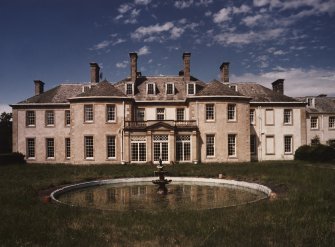 View from S showing garden front and circular pond