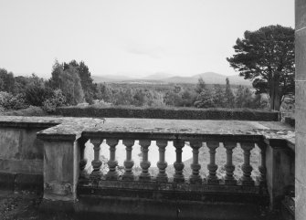 View to S from first floor balcony showing garden and panoramic views