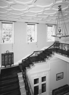 Interior. View of stair hall from S showing stair and vestibule entrance