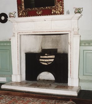 First floor, South East bedroom, fireplace, detail