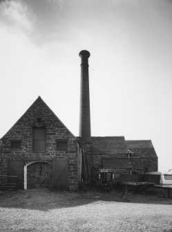 View of threshing barn and boilerhouse from south east