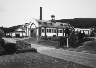 Exterior view from NW showing main block and former cooperage