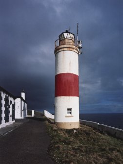 View of lighthouse tower from SW, with keepers' dwellings to left