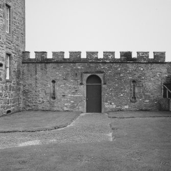 View of wall to east of castle with doorway