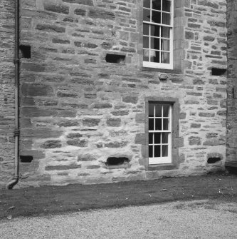 View of section of south wall of main block showing gun loops