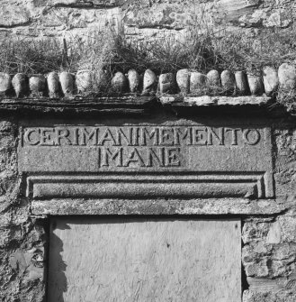 Courtyard wall, inscribed lintel detail