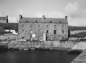 Breakwater wall and warehouse frontage