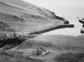 General view from north west with remains of fish smoking kiln in the foreground