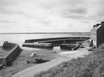 View of harbour and warehouse from south east