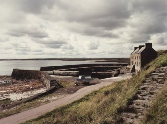 View of harbour and warehouse from south east