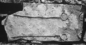 Fragment of incised cross-slab in north west side wall