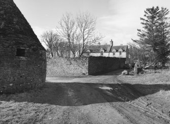 General view of farmhouse and walled garden from East.