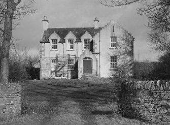 View of farmhouse from gates to South.