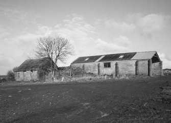 View of cottage and concrete shed from South East.