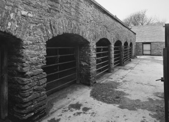 Courtyard, view of cart-shed from North East.