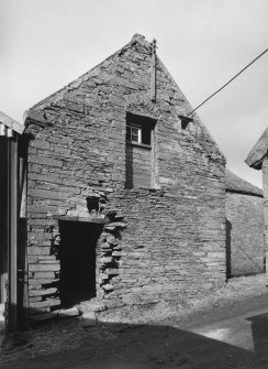 View of East gable of threshing barn from South East.