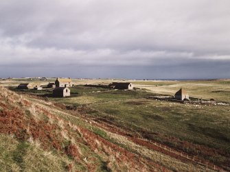 General view of Mausoleum and Mains of Ulbster farm from south-west