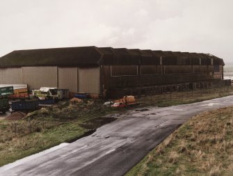 View from NE of southwestern C1 type hangar showing disabled doors at E end.