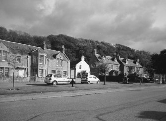 E side of street. View from NW