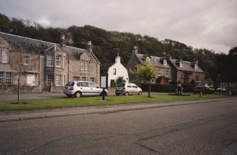 E side of street. View from NW