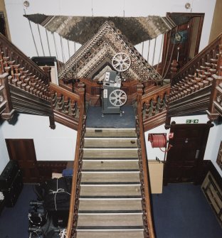 Interior. Elevated view of N wing  former Bishop's Palace  main stair from ESE