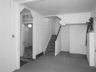 Interior. View of Tin House timber lined hallway