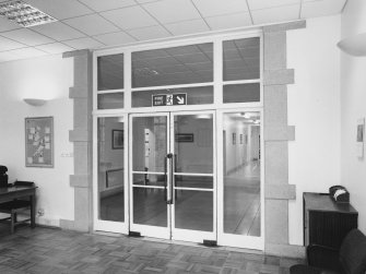 Interior. 1st floor, conference room, view of doors