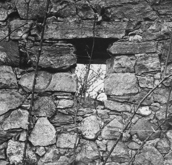 Surviving curtain wall: detail of gun-loop in internal face