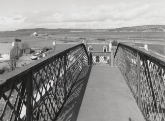 Inverness, Clachnaharry Railway Station, Footbridge
View from the south-south-east, taken from the top decking of the railway footbridge, looking out over the Beauly Firth, with the sea lock basin and the Sea Lock in the middle distance