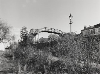 Inverness, Clachnaharry Railway Station, Footbridge
View from the north-west showing the wrought-iron lattice worked footbridge over the railway line