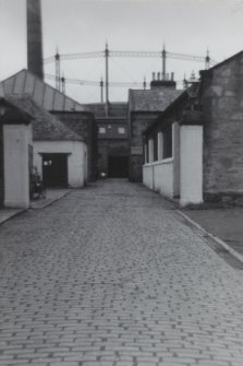 View down lane towards gas holder