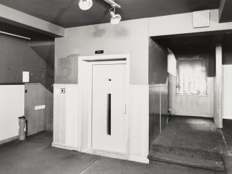 Interior view of 2nd floor lift and panelling from east, of 12 - 14 High Street