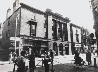 54, 56, 58 and 60 High Street, (Post Office).
General view of Post Office and adjoining shops with Workmen in the foreground.