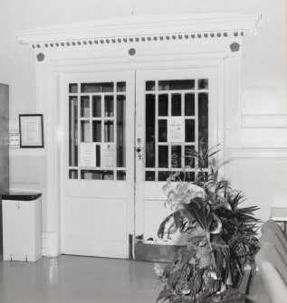 Interior. Detail of doors to recreation hall