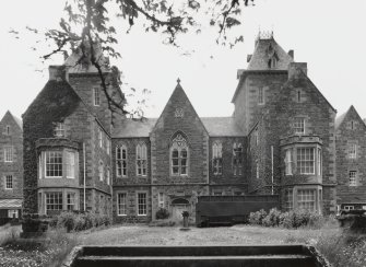 Main building. View of central entrance bay from ESE