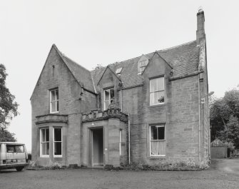 View from S E showing entrance front