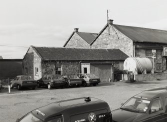 View from south of single-storeyed building to west of main shed