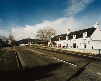 Inverness, Tomnahurich Swing Bridge over Caledonian Canal
Distant view of bridge from east, with neighbouring terrace of houses (right)