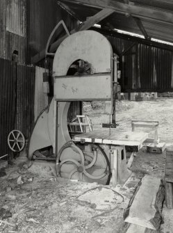 View of electric powered band saw, with tilting table