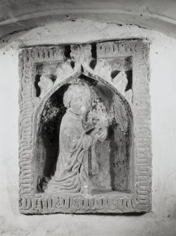 Detail of carved panel built into wall