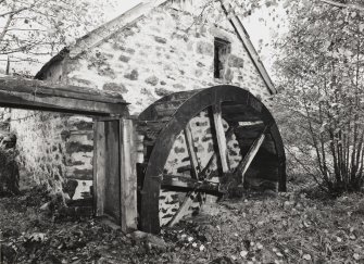 View of lade and waterwheel from West.