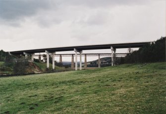 View from north east with railway viaduct behind