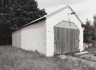 General view from SW of of timber-built General Store.