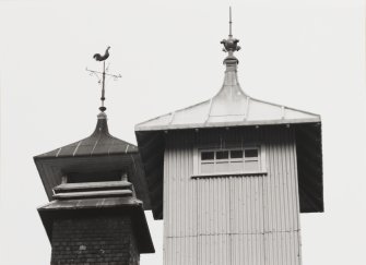 Detail of elevator tower and kiln ventilator roofs.